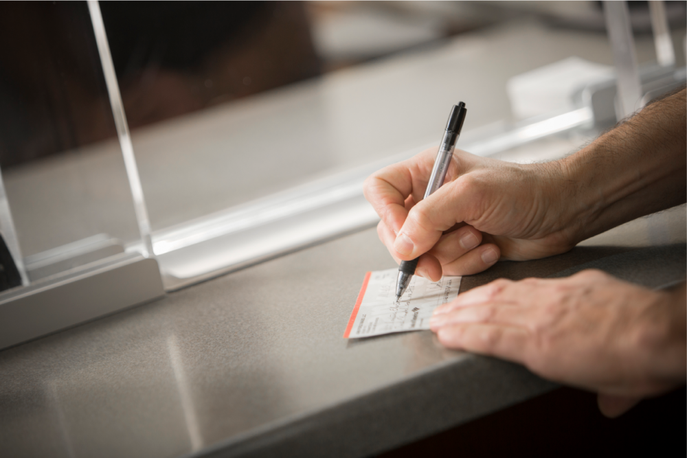 Image of check being written